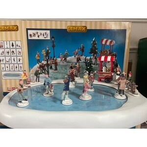 Lemax Village Animated Skating Pond with Sound Ice Skating & Hot Cocoa Stand Set